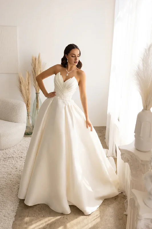 Pleated strapless satin and floor length wedding dress