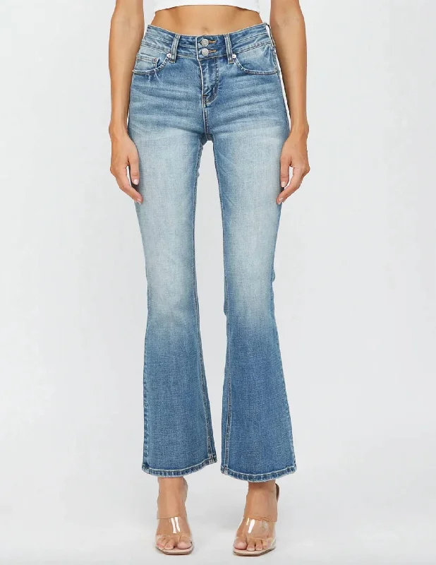 Mid Rise Double Button Bootcut Jean In Light Wash